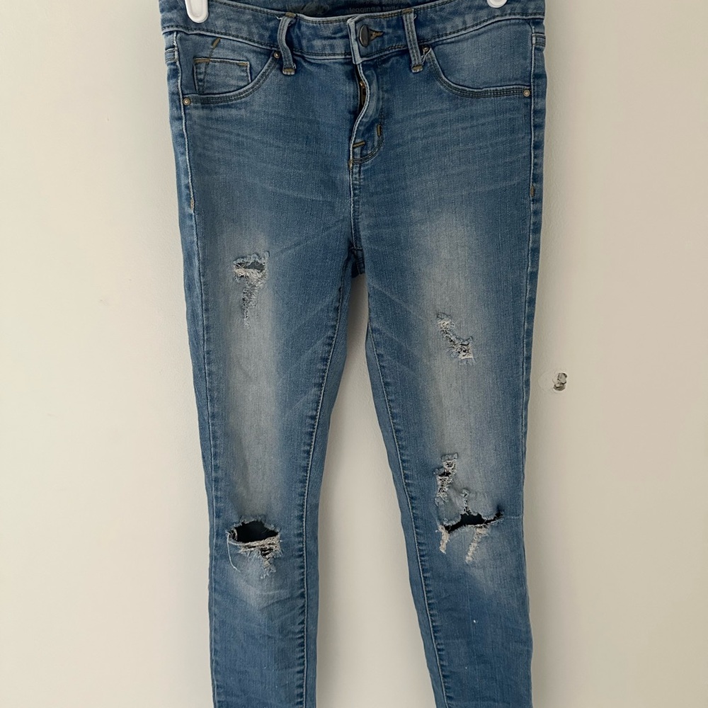 Distressed Blue Jeans